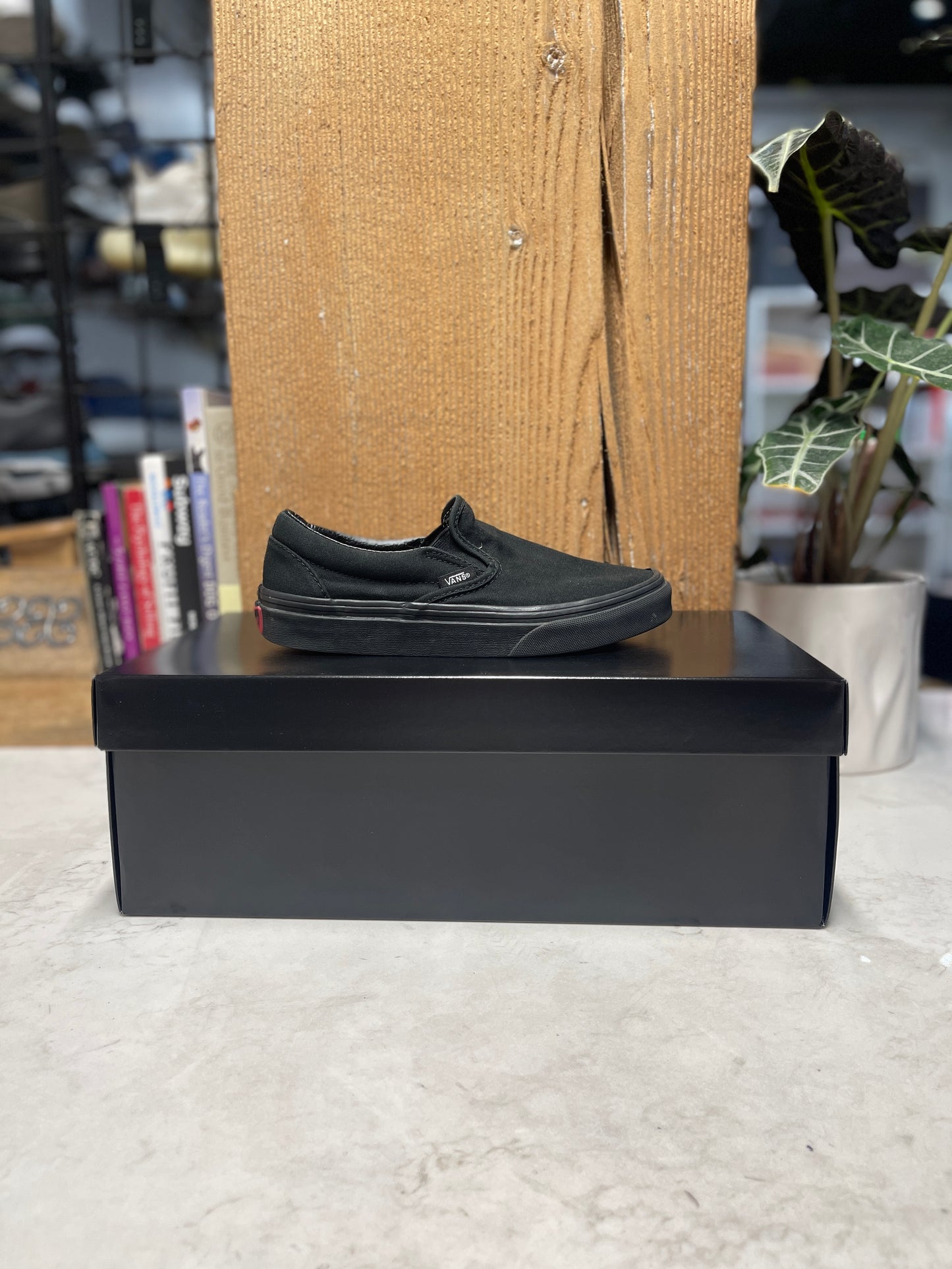 Black Vans Slip Ons (Size 4.5)